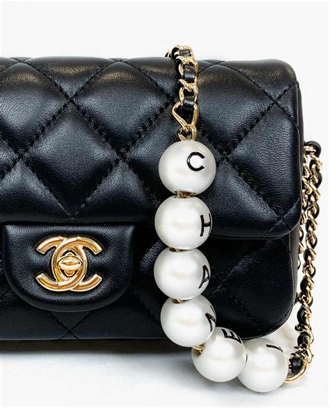 chanel purse with pearl chain|chanel clutch with chain 2023.